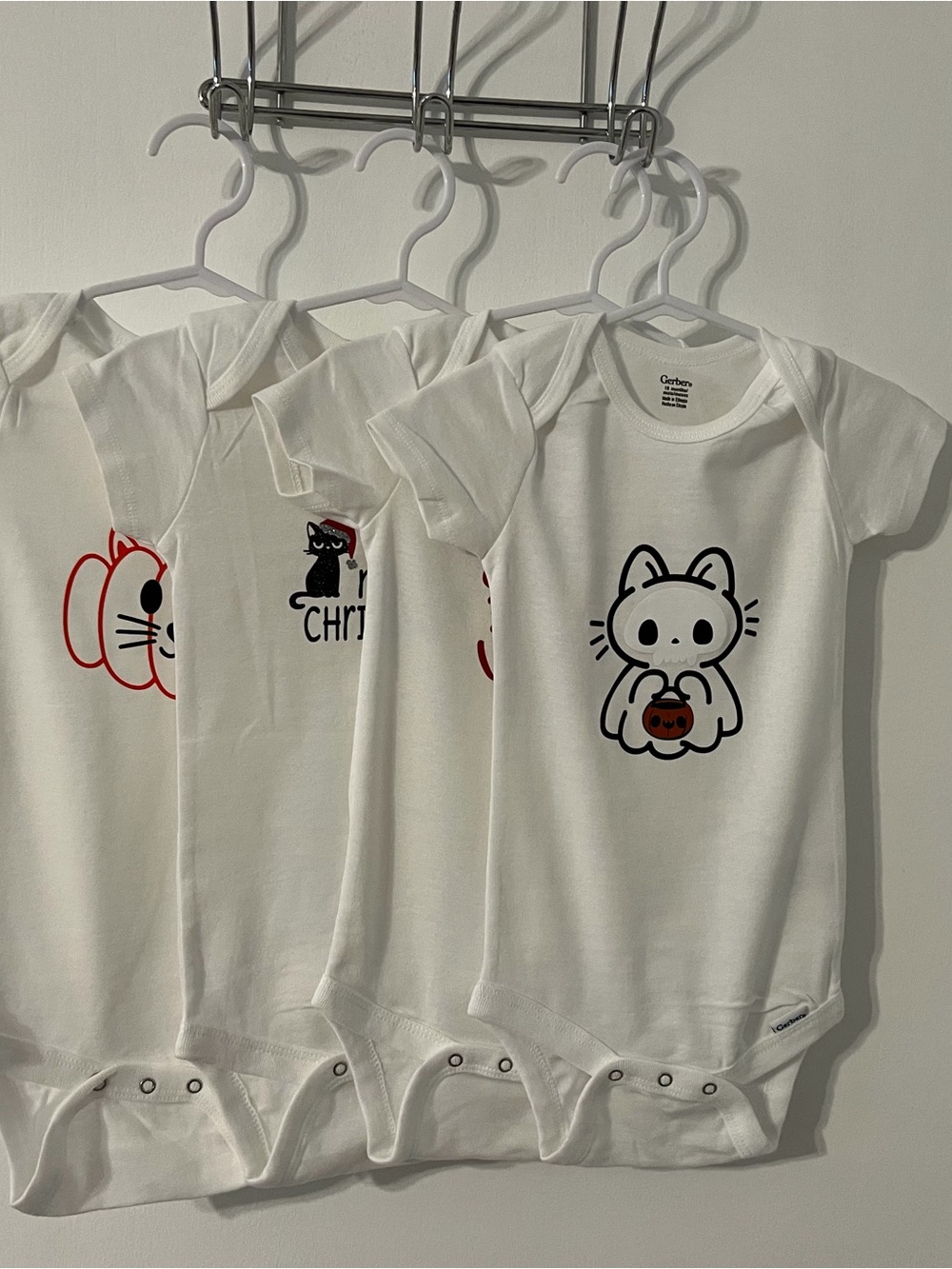 Gerber holiday onesies. 2 for Halloween and 2 for Christmas.